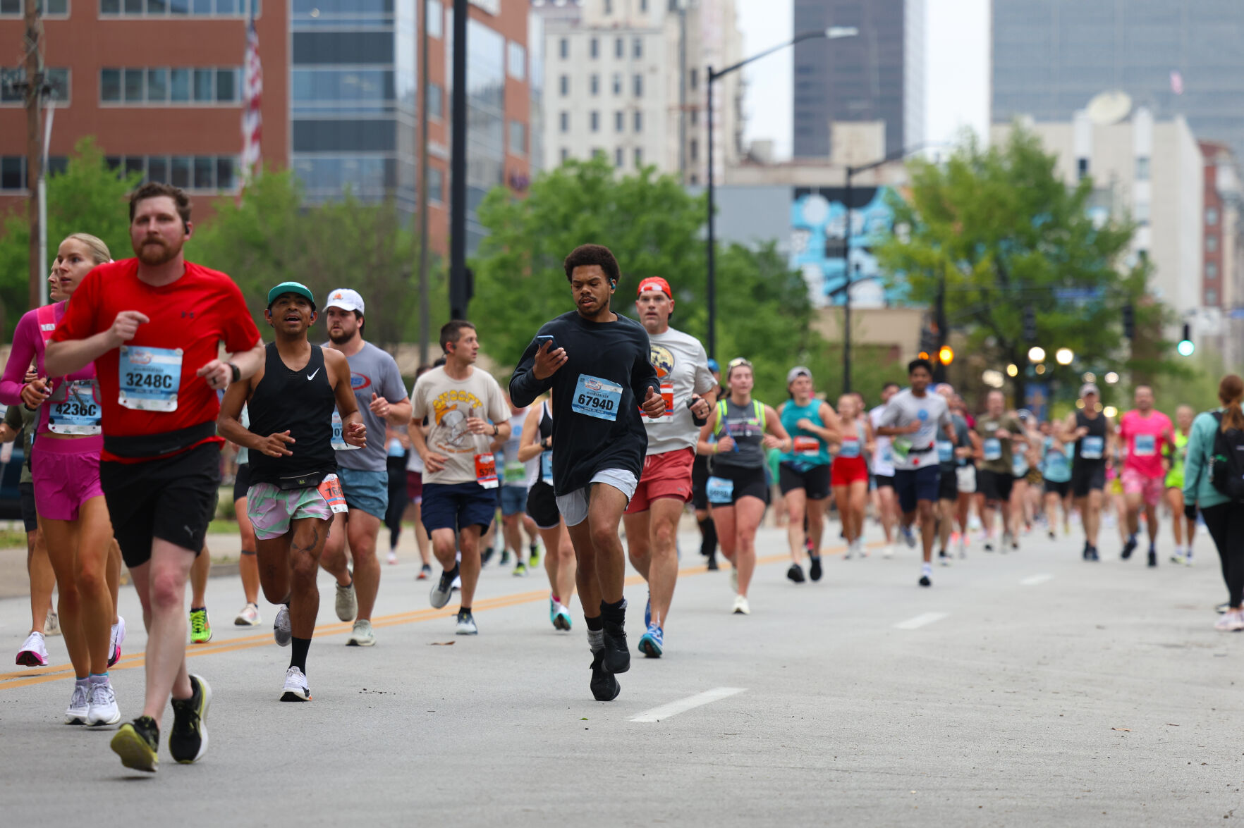 Group of runners on 4th Street during Marathon.JPG